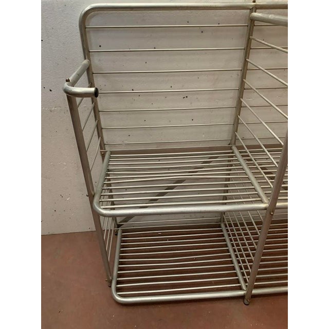 Curved aluminum bakery rack Two storage shelves Central divider Good condition Dimensions: H 118 x W 130 x D 51 cm 20th...