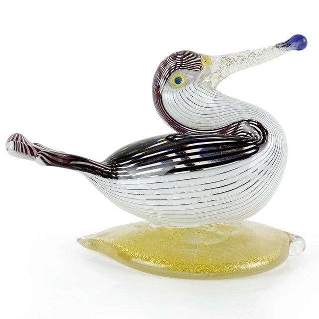 Beautiful vintage Murano hand blown black and white ribbons Italian art glass water bird sculpture on gold leaf base....