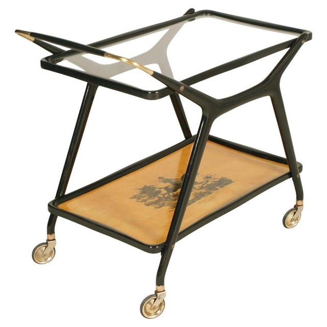Italian Serving Bar Cart in Sculptural Wood from Cassina, 1954, in Very Good conditions. Designed 1950 to 1959 This piece...