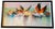 Original acrylic painting titled Flamingos in Flight by artist Michael Moulton. This large-scale horizontal composition...