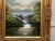 Whispers of the Falls - River Lake Waterfall with Lush Trees & Mountains in the distance. Vintage Oil Painting by British...