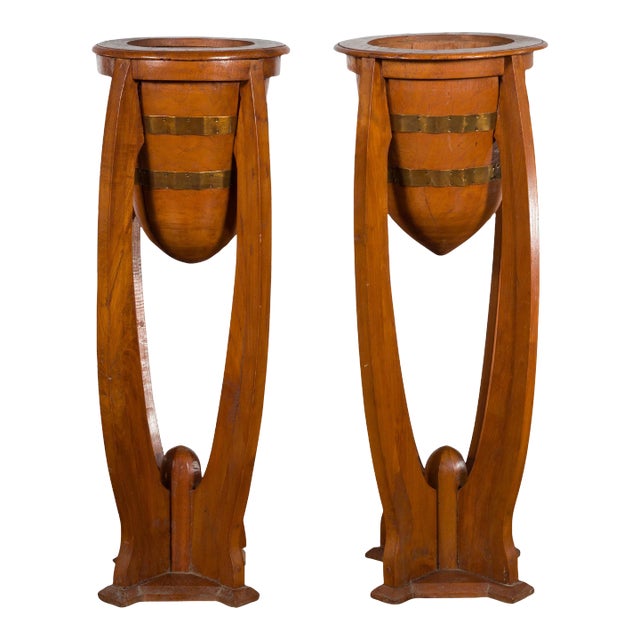 Mid 20th Century Javanese Art Deco Style Teak Wood & Brass Brace Plant Stands - A Pair For Sale