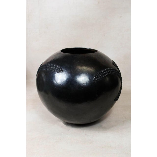 The Zulu pot, originating from South Africa, holds a distinguished role in the traditional practices of the Zulu people,...