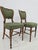 Elegant pair of late 19th century dining chairs, likely Austrian, crafted in the Victorian taste. Featuring shaped balloon...
