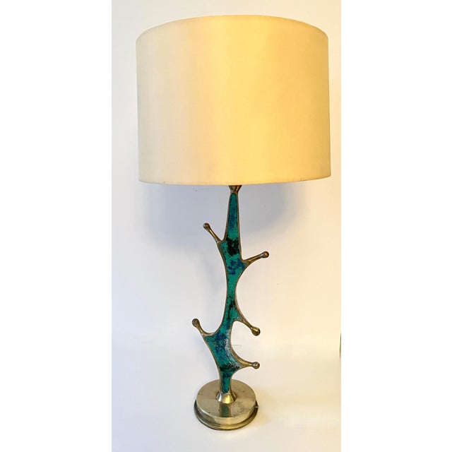 Mexican Artist, Pepe Mendoza, designs a wonderfully unique biomorphic Brass lamp with Turquoise Inlay. The hand Crafted...