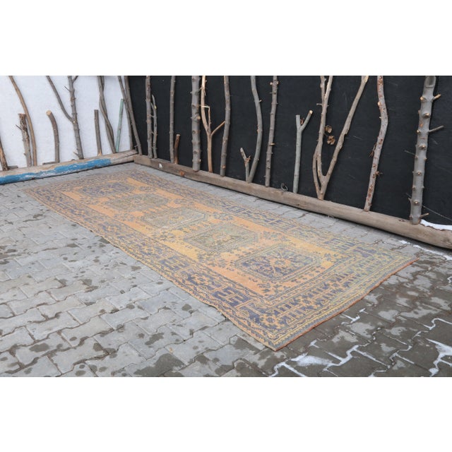 Vintage Turkish Hand-Knotted Wide Runner Rug is a semi-Vintage rug. '60s Eastern region of Turkey's unique rug is...