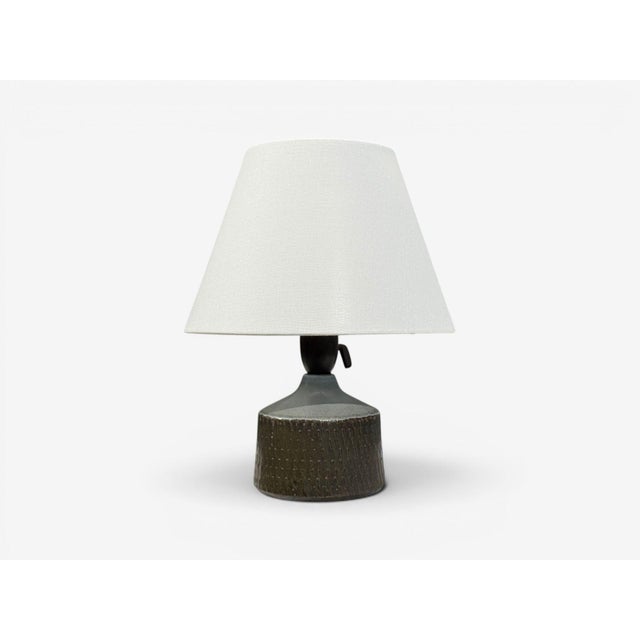 Swedish Mid-Century Modern, Small Table Lamp, Blue Ceramic, Sweden, 1960s A small partially glazed ceramic table lamp...