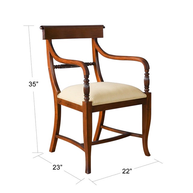 The Niagara Furniture Twist Back Arm Chair is a federal style dining chair hand carved from great quality, plantation...