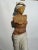 The sculpture depicts a life-size figure of a woman. it is made with an internal structure of plastic material, externally...