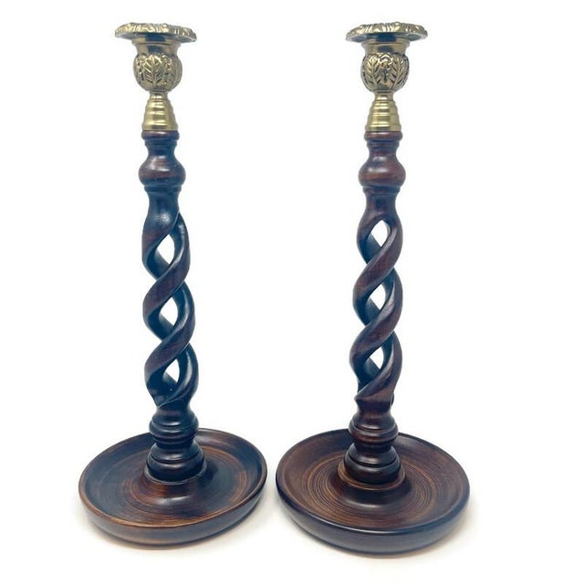 Vintage English Oak Candlesticks: Imported from England this exquisite pair boasts unique "open barley twist" design....