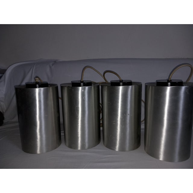 The pendant lamp from the 1970s was originally used as a shop window lamp. The pendant lamp is equipped with 1x E27...