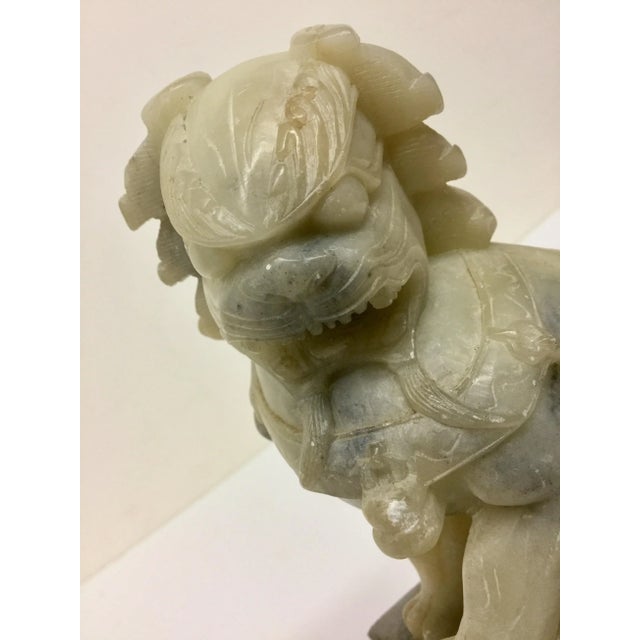Nice classic Chinese work of art for your bookcase or display cabinet. This Lion sits on a nice piece of Rosewood and...
