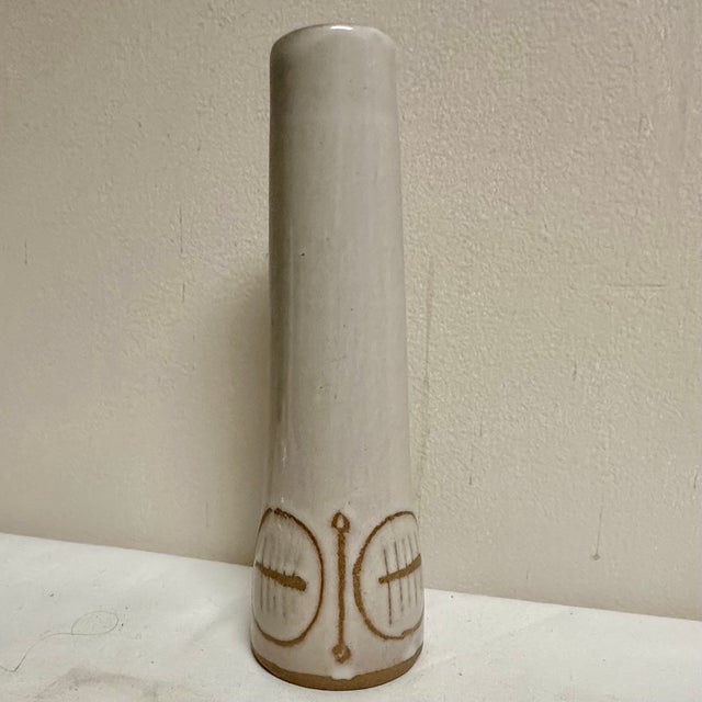 A Gordon and Jane Martz handmade ceramic vase with abstract incised design. 8”H x 2.5”D at base. Marshall Studios. Check...