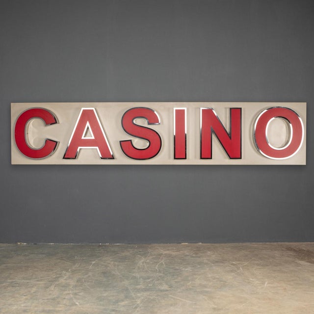 Superb 20th Century illuminating casino advertising sign, mounted on painted metal, letters in plastic with chrome edging,...