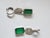 A very beautiful and useful, Emerald Dangle Earring set in 18K white Gold & Diamonds. The weight of the Emeralds is 17.57...
