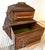 This box is a vintage American folk art piece commonly known as “Tramp Art,” likely created in the late 19th or early 20th...