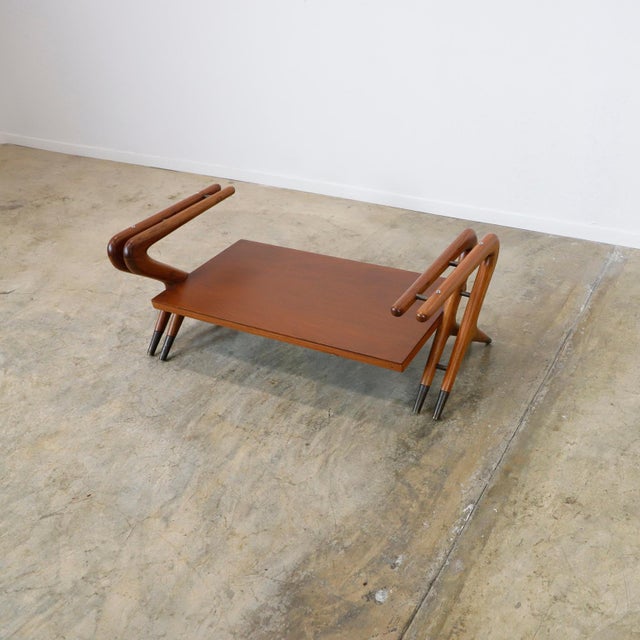 We offer this coffee table with the amazing and characteristic design of Eugenio Escudero, made in México in mahogany...