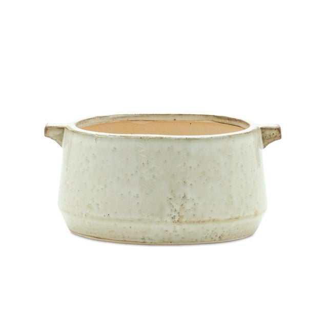 Add a touch of rustic charm to your home with the Rustic Terra Cotta Bowl Planter. Crafted from durable terracotta clay,...