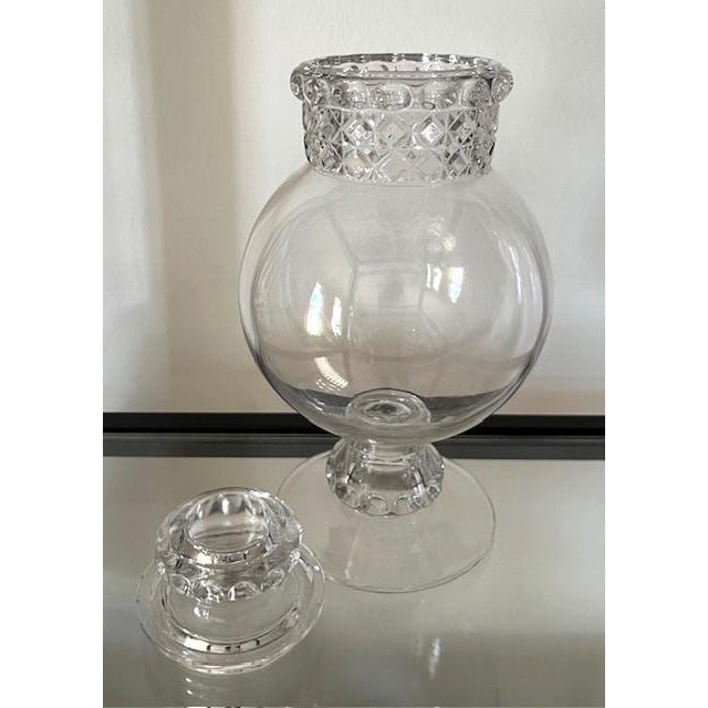 10" tall Tiffin Dakota pedestal apothecary jar/candy jar with bubble top dates to the early 20th century. It measures 4"...