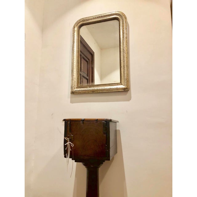 19th C. French Louis Philippe Silver Leaf Mirror Featuring an arched top, the beaded edges are incised with X-form...