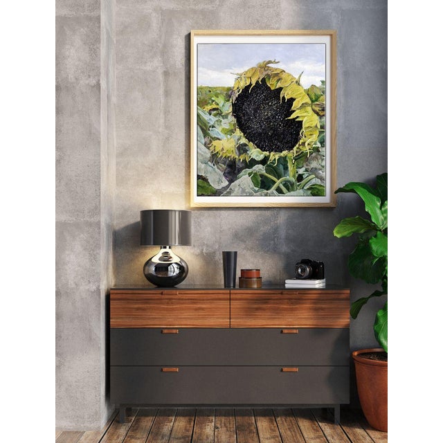 The oil painting entitled ""Seeds for the Future Harvest"" is a richly textured and detailed study of a mature sunflower....