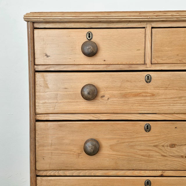 Dimensions: 36"W x 17.75"D x 37"H A classic antique pine chest of drawers, grounded in honest craftsmanship and quiet...