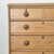 Dimensions: 36"W x 17.75"D x 37"H A classic antique pine chest of drawers, grounded in honest craftsmanship and quiet...