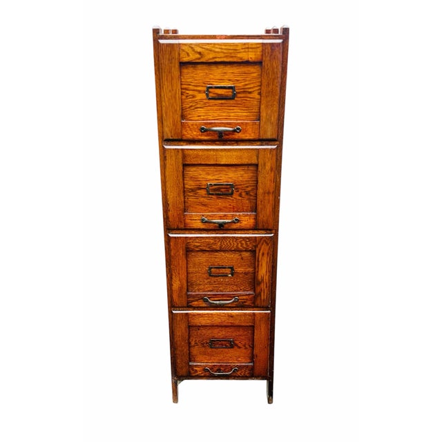 With our compliments Bay Colony Antiques takes the utmost pleasure in offering this exceptional antique file cabinet. This...