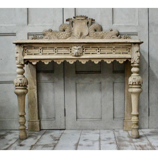 A superb bleached Oak Green man Hall Table. Made from English Oak, with heavy hand carving to the top, side and down the...