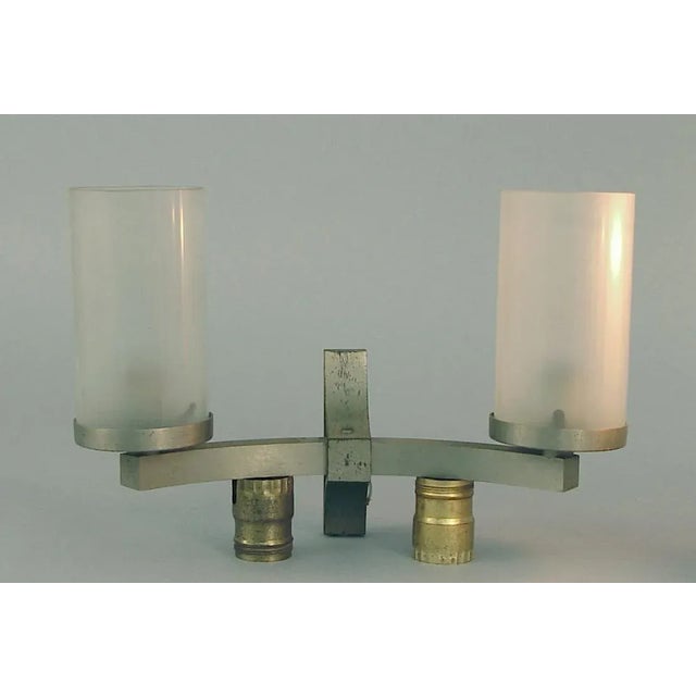 If you don't mind a little "antique patina," and you're a Modernist buff (but a forgiving one), these sconces will be just...