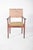 Armchair with upholstered seat and back. With typical mid-century modernist design, it has straight lines, a functional...