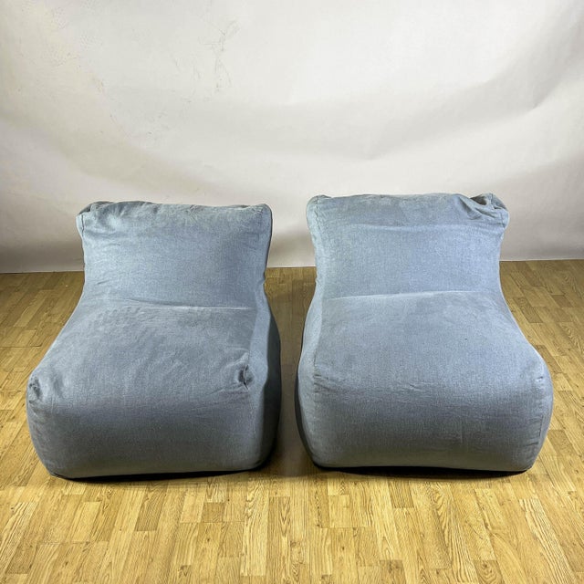 This pair of milano indoor armchairs represents a contemporary furnishing solution inspired by the soft, informal lines of...