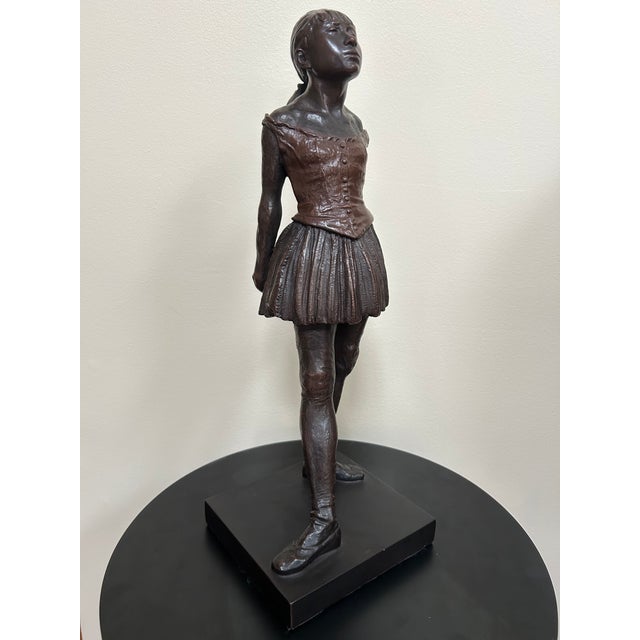 This is an authorized reproduction of Edgar Degas’ iconic Little Dancer ballerina sculpture, produced for the Boston...