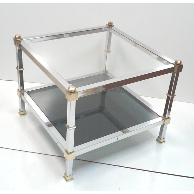 Hollywood Regency chrome end tables with brass plated accents, clear glass and smoked glass inserts can be interchanged....