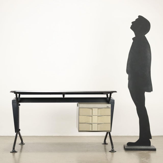 Desk with side drawers, in enamelled metal and top in wood-effect plastic laminate, drawer fronts in plastic material....