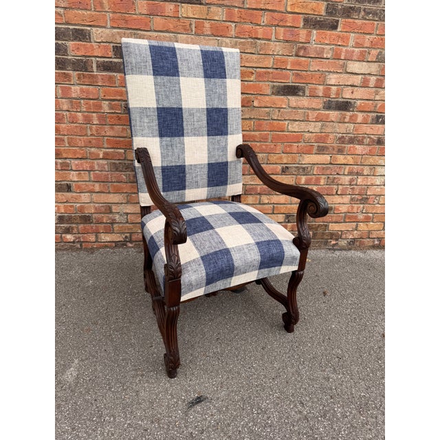 This armchair features a French Louis XIII style (specifically Os de Mouton) characterized by its distinctively curved...