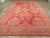 An antique Turkish Oushak large carpet handmade during the Early 20th century. Measures: 11' 11" x 17' 9"
