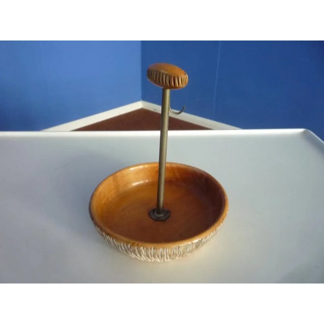 Very rare wooden bowl by Aldo Tura. Carved and with carrying handle. Label on the underbody. Very good original condition...