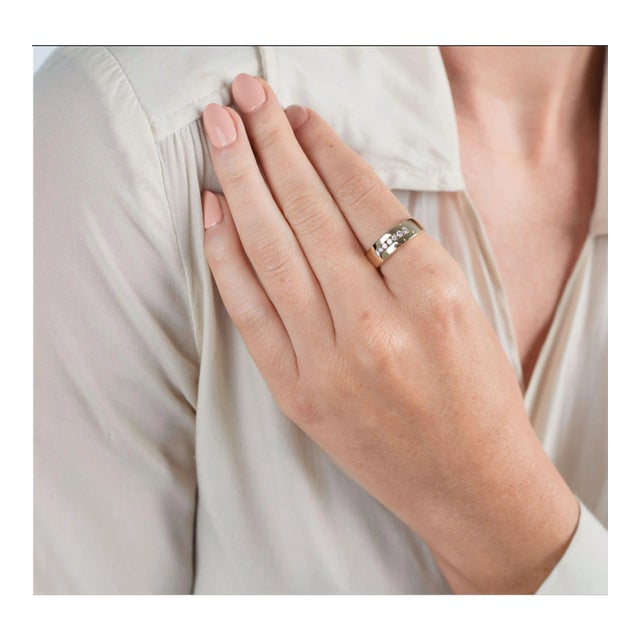 Shop this minimalist channel set natural diamond band set in 14k solid gold. A cute and dainty ring with 7 round cut...