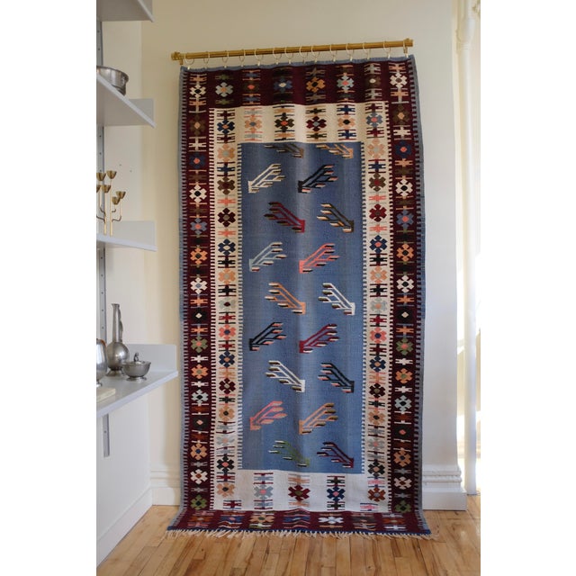 Large 20th century Wall Tapestry from Scandinavia. Beautiful mix of colors depicting a geometric flower design. A blue...