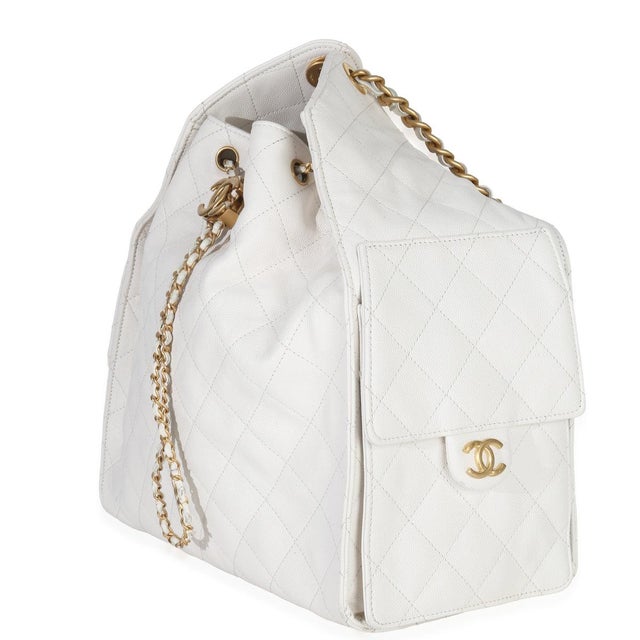Item #: Z152956 Features Interior: One card slot. Two side pockets Dimensions: 11.25 x 14.5 x 5.5 in Handbag Closure Type:...