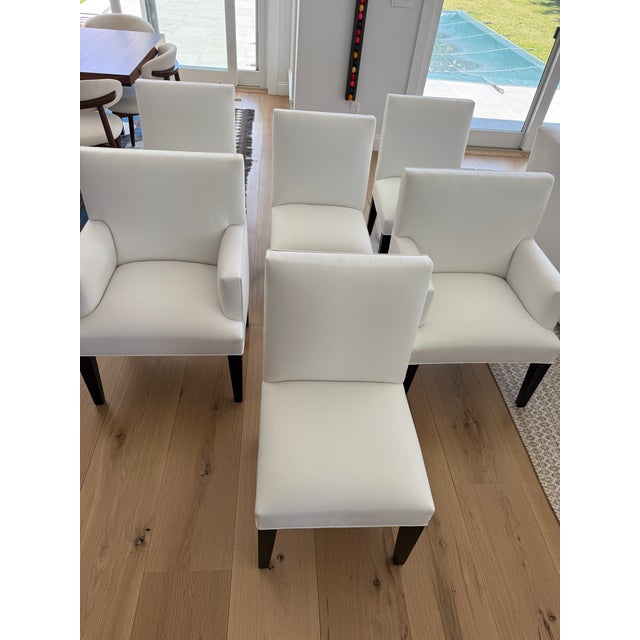 This beautiful set consists of two armchairs and four side chairs custom made by then duo Daniel Sachs and Fernando...