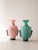 This exceptional pair of Murano glass vases evokes the classic shape of ancient Roman amphorae Meticulously handcrafted by...