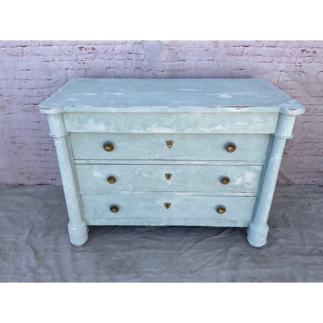 French Empire Painted Commode. Commode features the rectangular top with turret corners lending a strong yet elegant...