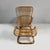 Italian Mid Century Modern rattan B4 armchair and pouf by Tito Agnoli, 1950s B4 armchair and pouf in finely woven rattan....