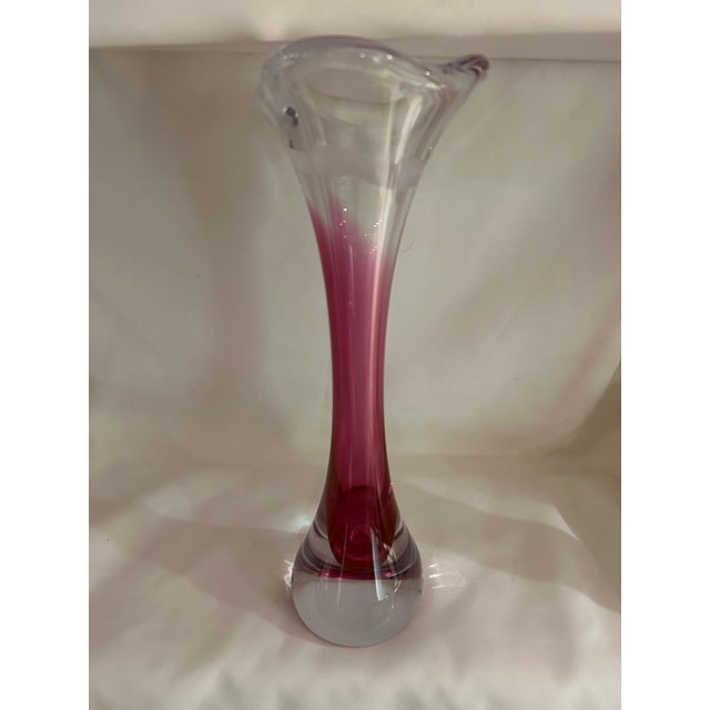 Vintage MCM clear and pink art glass vase. Part of the “Coquille" range designed by Swedish artist Paul Kedelv, who worked...