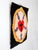 A mid century folk art textile wall hanging featuring the luther rose motif in saturated red, blue, cream, yellow, and...