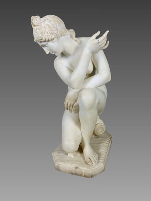 Early 19th-century white marble sculpture in the Neoclassical style depicting Venus at the Bath