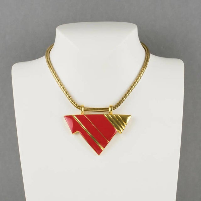 This stunning Lanvin Paris modernist pendant choker necklace features a serpentine gilded metal chain ornate with a...