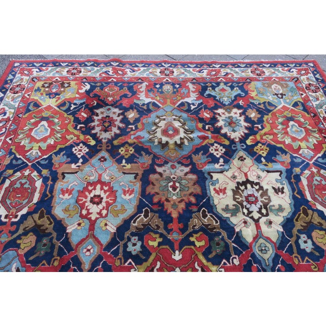 European hand-made hooked rug dating from about 1920, Germany or Austria. Large impressive lattice design with huge...